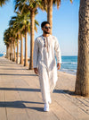 wearing omani thobe at beach by Furqanwear