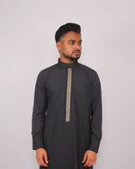 Black thobe embroidered.