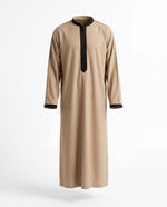 Muslim man wearing light beige Royal Thobe – full-length front view