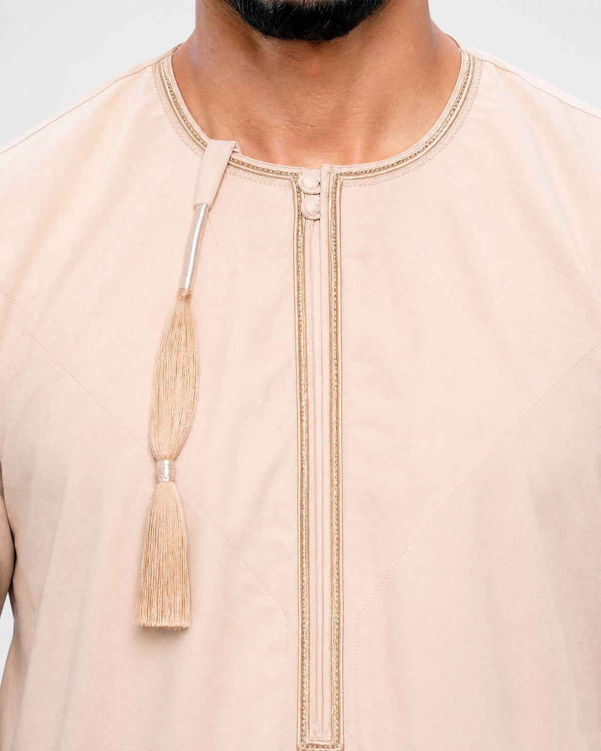 Peach Cream Omani Thobe – close up 100% wrinkle-free spun polyester soft peach fabric | Furqanwear