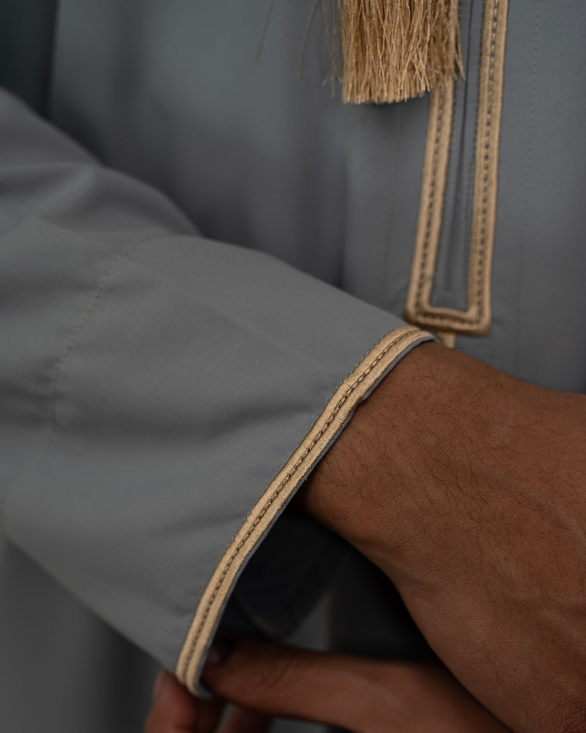 Grey Omani thobe side view breathable spun polyester — FurqanWear