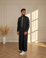 Front view of Black Saudi Thobe with Gold Embroidery — structured collar and gold detailing — Furqanwear
