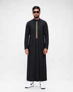 Black Saudi thobe for men with gold embroidery and structured collar — Furqanwear