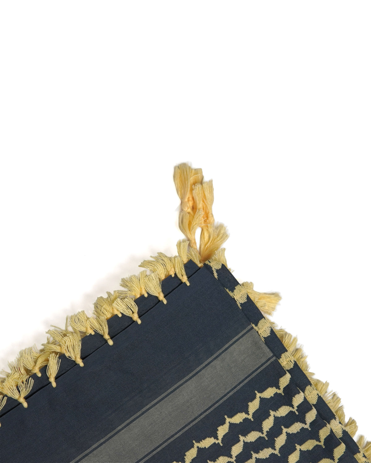 Black and Yellow Authentic keffiyeh (shemagh) available online, Toronto, near Toronto, Ontario. Traditional kaffiyeh (kufiya) design. Versatile keffiyeh scarf and arab head scarf. Also a stylish shemagh scarf. Learn how to wear a keffiyeh and about keffiyeh and shemagh