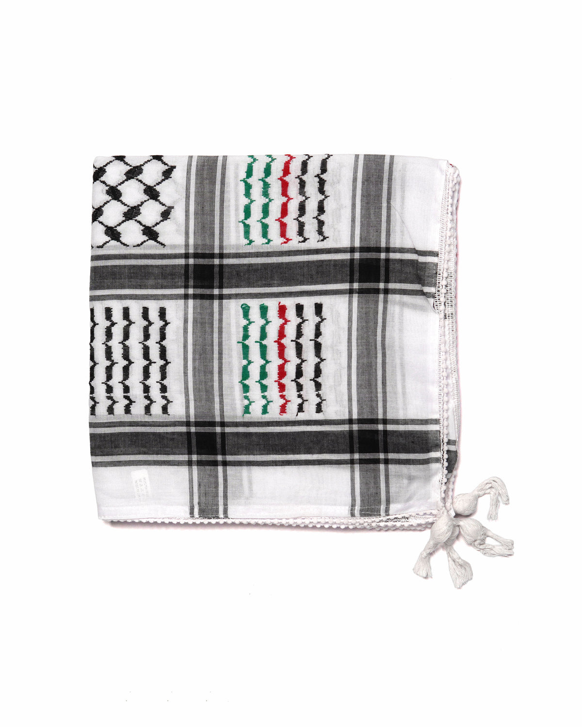 White Black Red and Green, Authentic keffiyeh (shemagh) available online, Toronto, near Toronto, Ontario. Traditional kaffiyeh (kufiya) design. Versatile keffiyeh scarf and arab head scarf. Also a stylish shemagh scarf. Learn how to wear a keffiyeh and about keffiyeh and shemagh