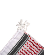 White Black Red and Green, Authentic keffiyeh (shemagh) available online, Toronto, near Toronto, Ontario. Traditional kaffiyeh (kufiya) design. Versatile keffiyeh scarf and arab head scarf. Also a stylish shemagh scarf. Learn how to wear a keffiyeh and about keffiyeh and shemagh