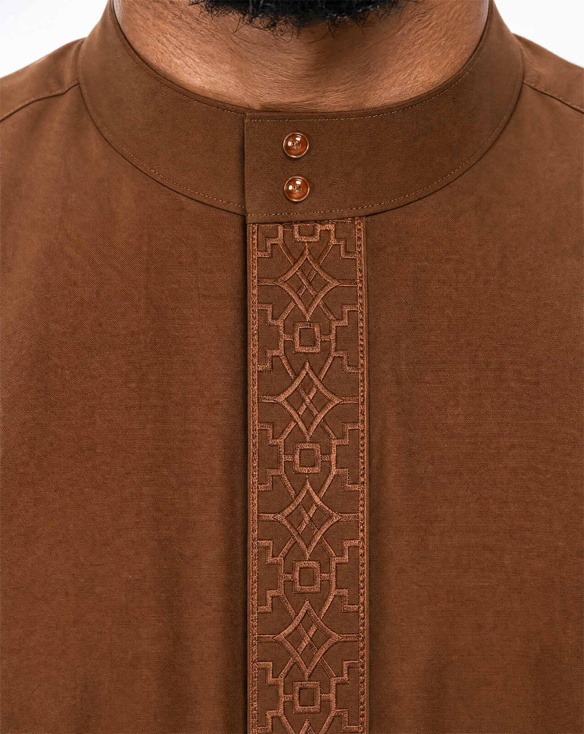 Muslim man wearing copper brown Saudi thobe for daily modest wear and Jummah close details — Furqanwear