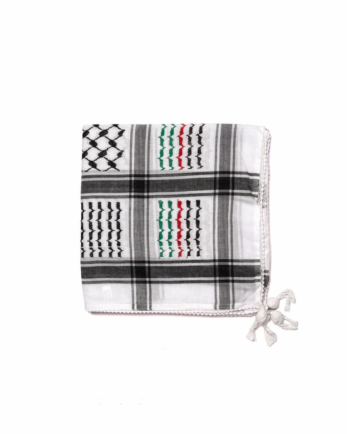 White Black Red and Green, Authentic keffiyeh (shemagh) available online, Toronto, near Toronto, Ontario. Traditional kaffiyeh (kufiya) design. Versatile keffiyeh scarf and arab head scarf. Also a stylish shemagh scarf. Learn how to wear a keffiyeh and about keffiyeh and shemagh