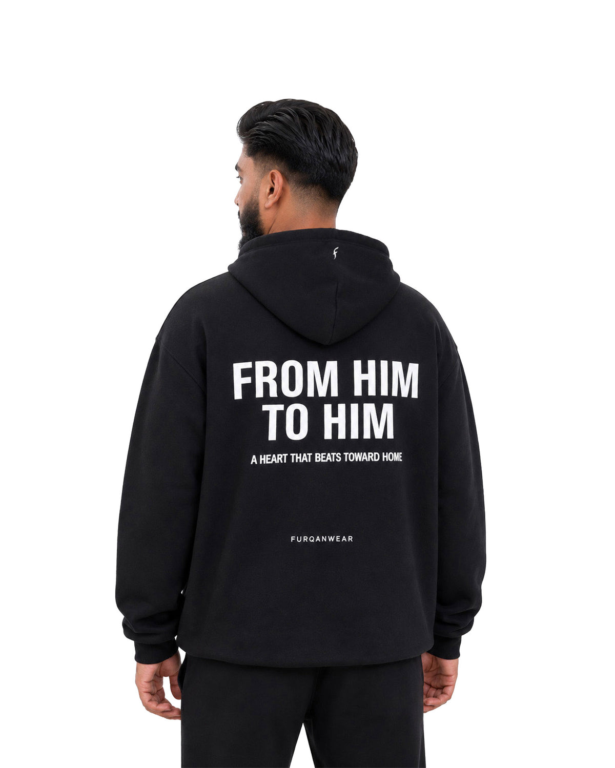 Back of black Furqanwear Islamic hoodie, worn by a man